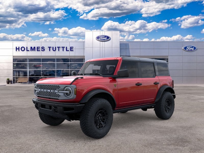 2026 Ford Bronco Badlands in Ruby Red Metallic Tinted Clearcoat — front three-quarter view