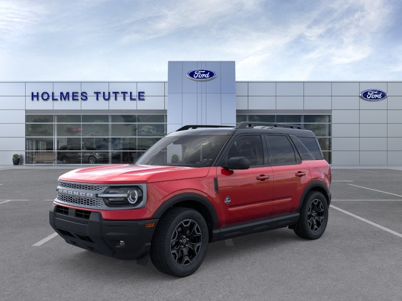 2026 Ford Bronco Sport Outer Banks in Ruby Red Metallic Tinted Clearcoat — front three-quarter view